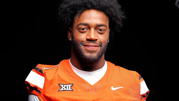 Oklahoma State's Xavier Benson poses for a photograph during media for the Oklahoma State University Cowboys football media days in Stillwater, Okla., Saturday, Aug., 5, 2023.